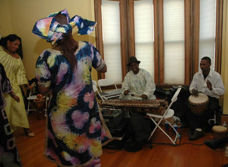 Balla Kouyate on balafon and Markane Kouyate on talking drum. Photo by Maggie Holtzberg.