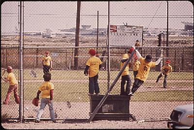 LOGAN AIRPORT AREA. LITTLE LEAGUE GAME ON LAND LOANED BY MASSPORT (MASSACHUSETTS PORT AUTHORITY) NEAR BENNINGTON STREET EAST BOSTON'S MAIN THOROUGHFARE. SOME LOCAL CITIZEN LEADERS CONSIDER THIS TO BE PART OF A PUBLIC RELATIONS CAMPAIGN BY MASSPORT ON BEHALF OF IT'S CONTINUING INROADS INTO THE NEIGHBORHOOD, 05/1973