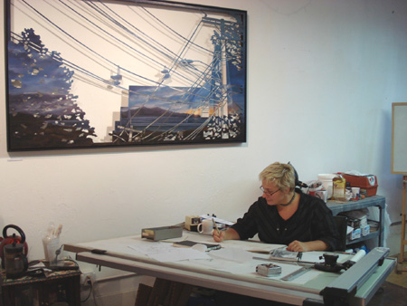 Rachel Mello sketches in her studio