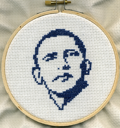 Emily Gallardo, Barack Obama portrait pin (2008), cross-stitch embroidery