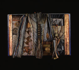 Sherrill Hunnibell, COMING FIRST (2001), mixed media altered book, 7 in x 9 in x 1 in