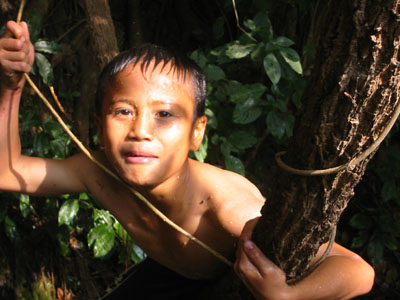 Thailand: This boy showed me the way to a jungle waterfall.