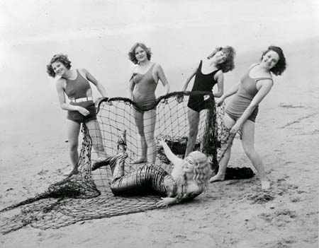 Bathing girls catch mermaid on California Beach, 1933