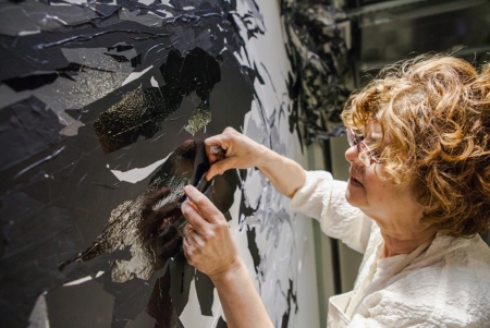 Debra Weisberg creates a drawing installation at the Facebook Cambridge Office. Photo by Simone Scheiss.