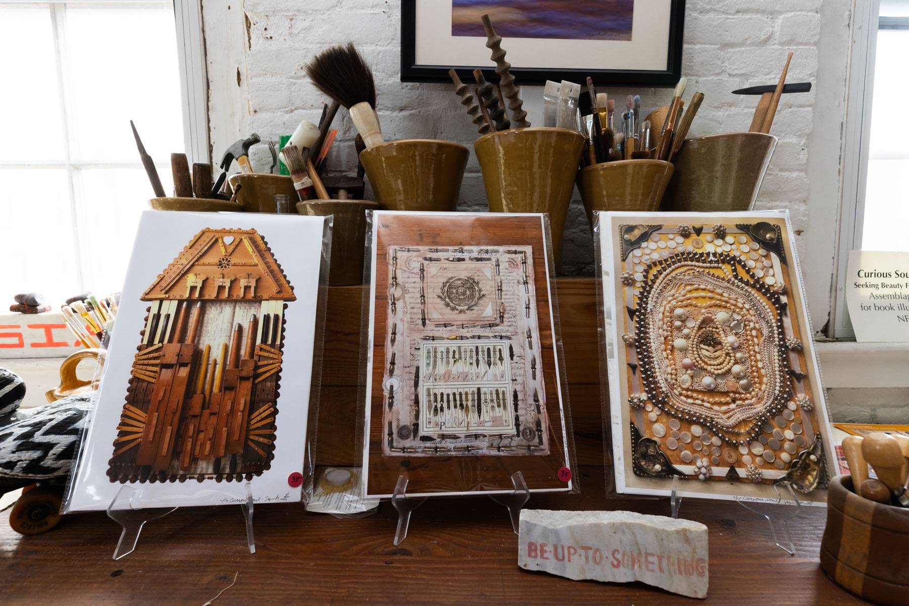 An artist studio with a range of multi-media artworks.
