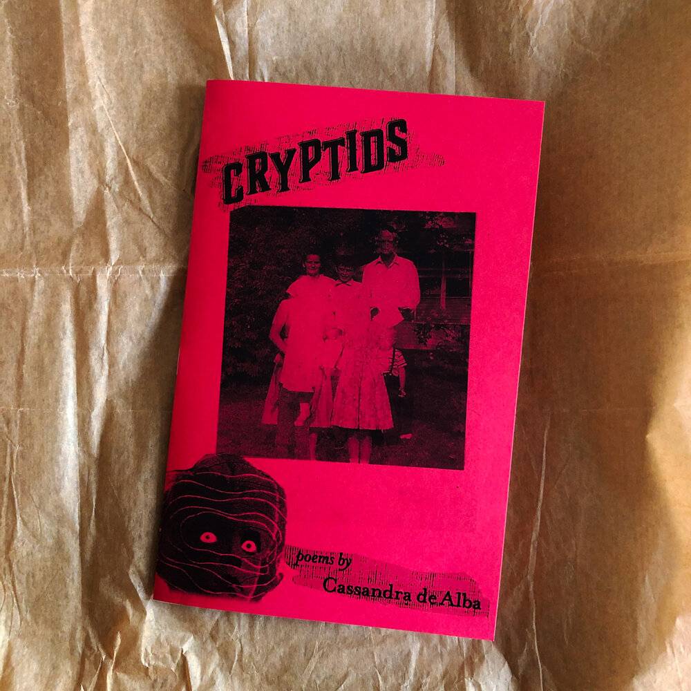 Cover art for CRYPTIDS by Cassandra de Alba (Poetry Finalist '20) & Aly Pierce (Ginger Bug Press 2020).